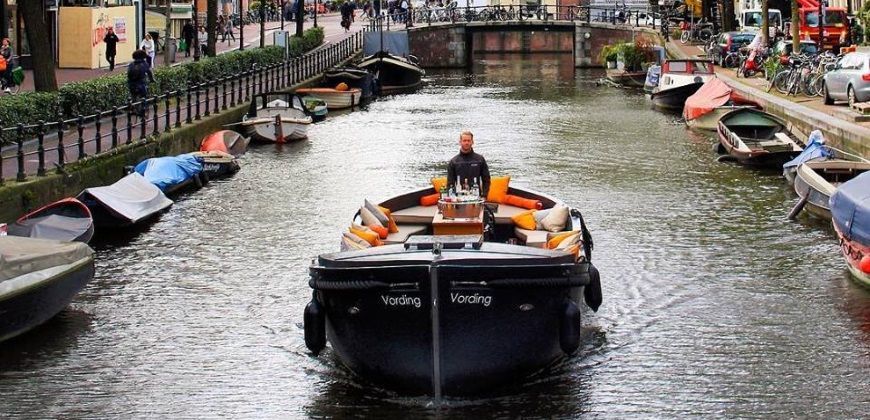 varen grachten amsterdam met sloep vording